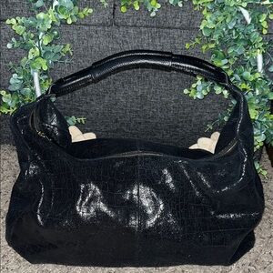Lola Bernard croc-embossed leather hobo bag.